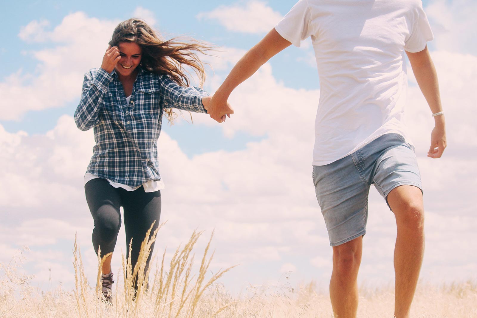 After a Couple Relationship Assessment, two people are having fun outdoors 