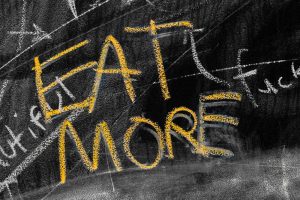 picture saying 'eat more' which is an example of a typical unhelpful thought which cbt for weight loss in manchester can help with