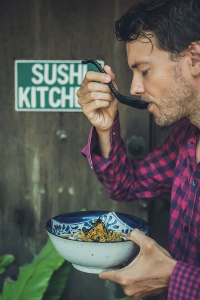 Man enjoying taste of his food which is what cbt for weigh loss in Manchester can help with